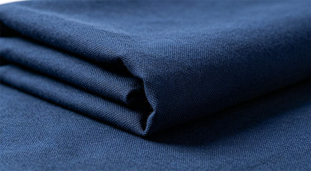 Close‑up of cotton fabric material used for school dormitory bedding, breathable natural cotton weave Close‑up of cotton fabric material used for school dormitory bedding, breathable natural cotton weave