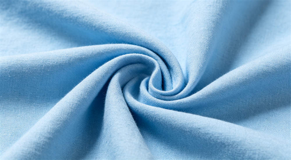 Close‑up of cotton fabric material used for school dormitory bedding, hard‑wearing cotton composition Close‑up of cotton fabric material used for school dormitory bedding, hard‑wearing cotton composition