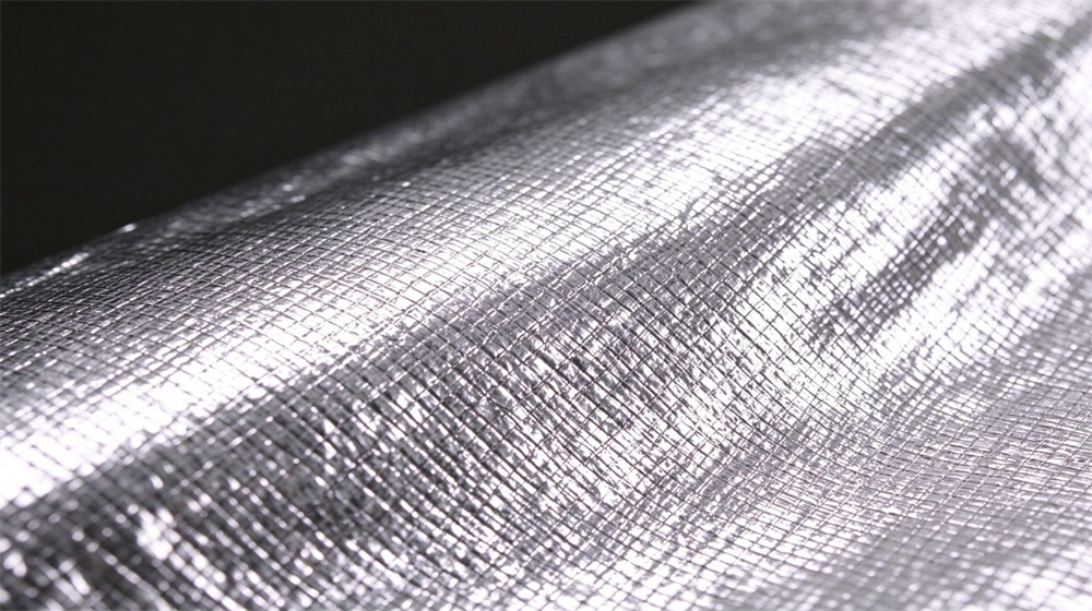 Aerial perspective of heavy duty protective aluminized heat protective suit, Close up of costmir aluminized fabric coating texture, aluminized heat protective suit, demonstrating professional info use in industrial safety environment, designed for wholesale bulk supply and industrial safety procurement. Aerial perspective of heavy duty protective aluminized heat protective suit, Close up of costmir aluminized fabric coating texture, aluminized heat protective suit, demonstrating professional info use in industrial safety environment, designed for wholesale bulk supply and industrial safety procurement.