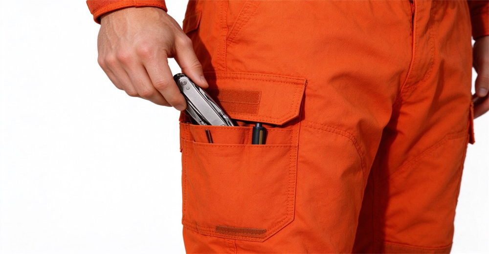 Functional multi compartment pocket on fire suit, designed for quick access and convenient storage of small operation tools Functional multi compartment pocket on fire suit, designed for quick access and convenient storage of small operation tools